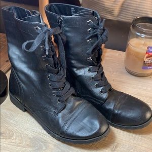 Black leather boots with zipper